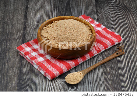 Organic Oleaster Seed Powder in a Rustic Wooden Bowl on a wooden Background for Healthy Living Organic Oleaster Seed Powder in a Rustic Wooden Bowl on a wooden Background for Healthy Living 138476432