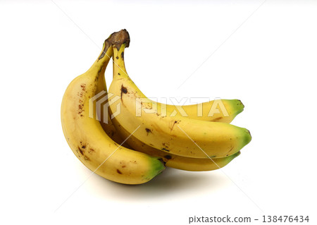 Ripe yellow big bananas isolated on white background. File contains clipping path Ripe yellow big bananas isolated on white background. File contains clipping path 138476434