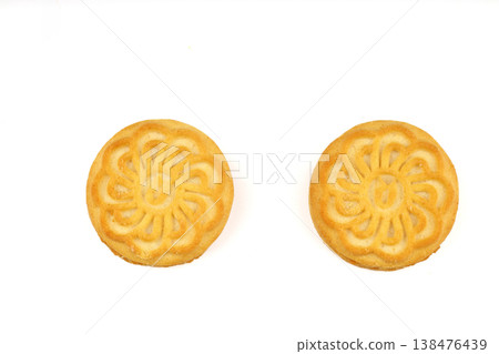 Delicious Crispy Sandwich Biscuit with Smooth Vanilla Cream Filling Isolated on White Background Delicious Crispy Sandwich Biscuit with Smooth Vanilla Cream Filling Isolated on White Background 138476439