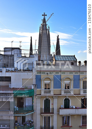 The Sagrada Familia with a cross placed on its main tower. The Sagrada Familia with a cross placed on its main tower. 138476810