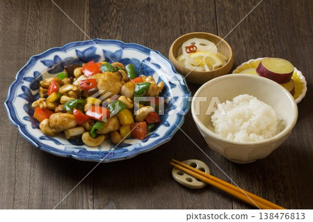Chicken stir-fried with cashews and white rice Chicken stir-fried with cashews and white rice 138476813