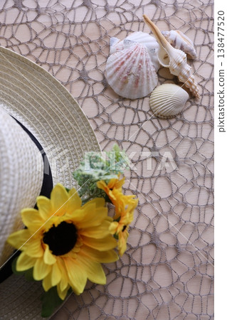 Summer flowers and straw hats Summer flowers and straw hats 138477520