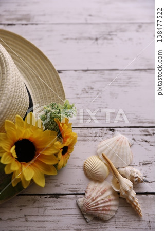 Summer flowers and straw hats Summer flowers and straw hats 138477522