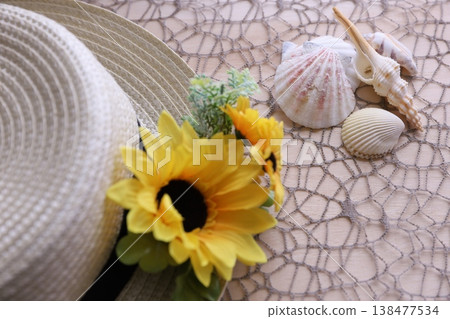 Summer flowers and straw hats Summer flowers and straw hats 138477534