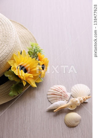 Summer flowers and straw hats Summer flowers and straw hats 138477628