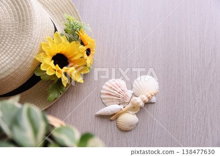 Summer flowers and straw hats Summer flowers and straw hats 138477630