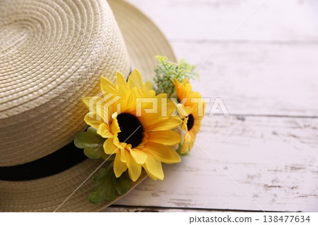Summer flowers and straw hats Summer flowers and straw hats 138477634
