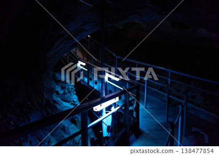 Neon lights inside a limestone cave 138477854