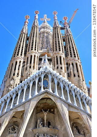 The Sagrada Familia with a cross installed. The Sagrada Familia with a cross installed. 138478547