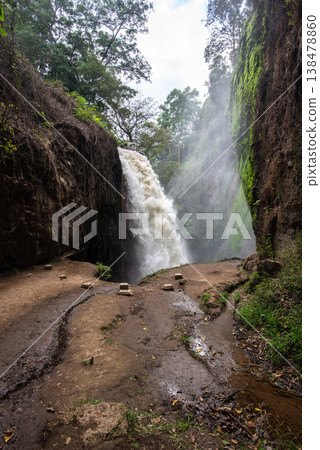 Scenery view of powerful of Blawan waterfall located in Kalianyar village, Sempol district of East Java, Indonesia. 138478860