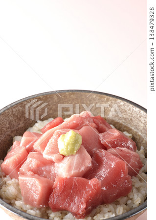 A single serving photo of a bowl of diced tuna. A single serving photo of a bowl of diced tuna. 138479328
