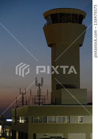 The sky painted in the colors of twilight and the control tower of Kobe Airport. The sky painted in the colors of twilight and the control tower of Kobe Airport. 138479375