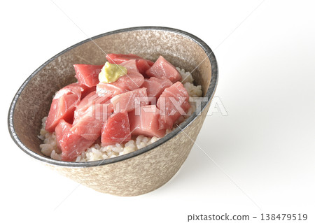 A bowl of diced tuna photographed alone against a white background. A bowl of diced tuna photographed alone against a white background. 138479519