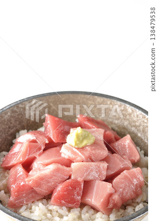 A bowl of diced tuna photographed alone against a white background. A bowl of diced tuna photographed alone against a white background. 138479538