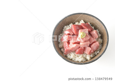 A bowl of diced tuna photographed alone against a white background. A bowl of diced tuna photographed alone against a white background. 138479549