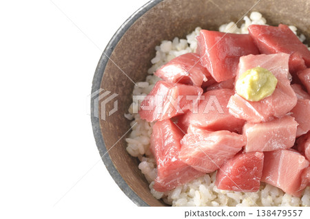 A bowl of diced tuna photographed alone against a white background. A bowl of diced tuna photographed alone against a white background. 138479557