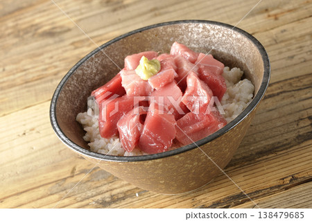 A single serving photo of a bowl of diced tuna. A single serving photo of a bowl of diced tuna. 138479685