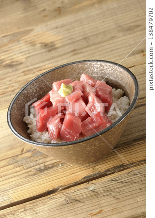 A single serving photo of a bowl of diced tuna. A single serving photo of a bowl of diced tuna. 138479702