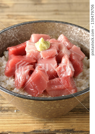 A single serving photo of a bowl of diced tuna. A single serving photo of a bowl of diced tuna. 138479706