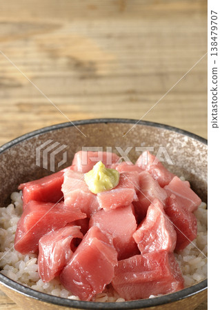 A single serving photo of a bowl of diced tuna. A single serving photo of a bowl of diced tuna. 138479707