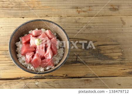 A single serving photo of a bowl of diced tuna. A single serving photo of a bowl of diced tuna. 138479712