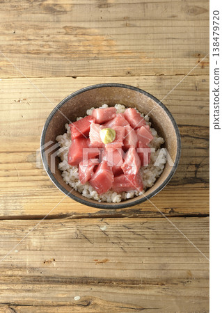 A single serving photo of a bowl of diced tuna. A single serving photo of a bowl of diced tuna. 138479720
