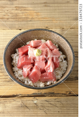 A single serving photo of a bowl of diced tuna. 138479723
