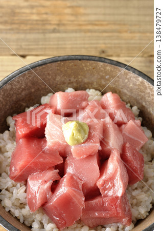 A single serving photo of a bowl of diced tuna. A single serving photo of a bowl of diced tuna. 138479727