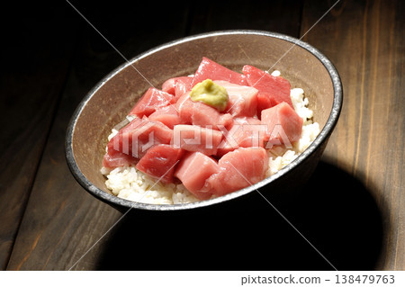 A single serving photo of a bowl of diced tuna. A single serving photo of a bowl of diced tuna. 138479763