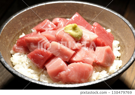A single serving photo of a bowl of diced tuna. A single serving photo of a bowl of diced tuna. 138479769