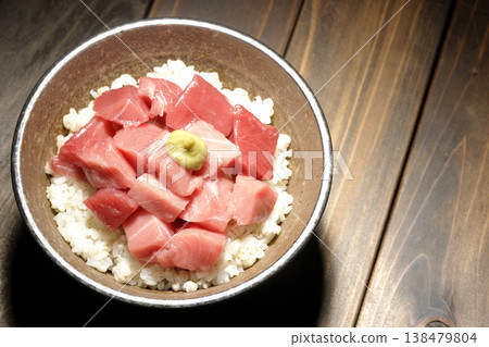 A single serving photo of a bowl of diced tuna. A single serving photo of a bowl of diced tuna. 138479804