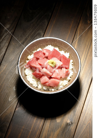 A single serving photo of a bowl of diced tuna. A single serving photo of a bowl of diced tuna. 138479809