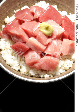 A single serving photo of a bowl of diced tuna. A single serving photo of a bowl of diced tuna. 138479817