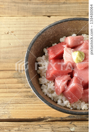A single serving photo of a bowl of diced tuna. A single serving photo of a bowl of diced tuna. 138480064