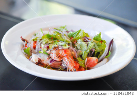 spicy salad or noodles salad, Thai spicy salad or vermicelli and seafood salad or vermicelli salad or grass noodles salad spicy salad or noodles salad, Thai spicy salad or vermicelli and seafood salad or vermicelli salad or grass noodles salad 138481048