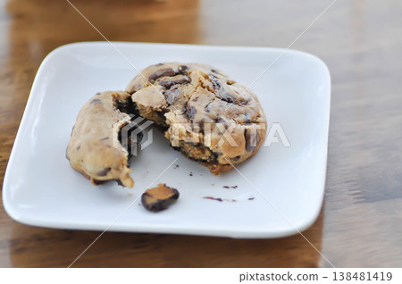 cookie, cooky or chocolate chip cookie or chocolate cookie or soft cookie 138481419