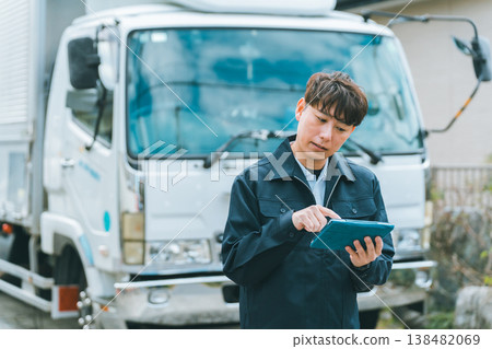 Truck drivers unfamiliar with tablet operation 138482069