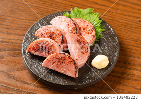 Unzen Ham: A Nagasaki specialty dish, grilled to perfection for a juicy finish. Unzen Ham: A Nagasaki specialty dish, grilled to perfection for a juicy finish. 138482228