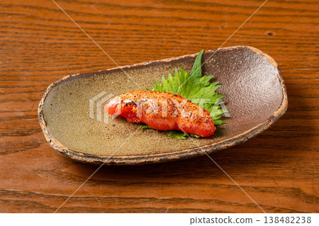 Grilled mentaiko (spicy cod roe): A popular snack grilled to perfection. 138482238