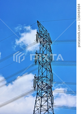Power transmission towers and power lines soaring into the blue sky: Infrastructure Industry Power transmission towers and power lines soaring into the blue sky: Infrastructure Industry 138484984