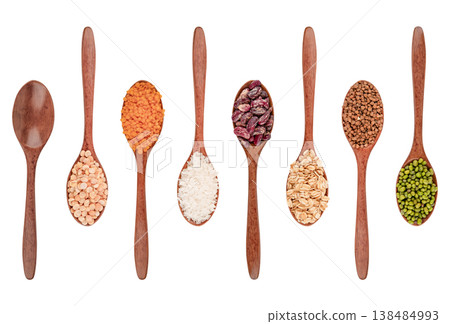 Set of different cereals in wooden spoons isolated on white background Set of different cereals in wooden spoons isolated on white background 138484993