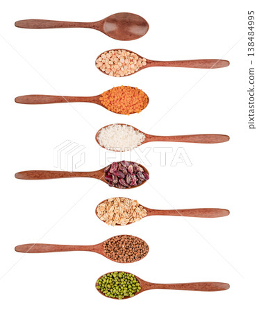 Set of different cereals in wooden spoons isolated on white background Set of different cereals in wooden spoons isolated on white background 138484995