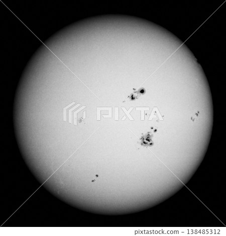 Giant sunspots on the surface of the sun Giant sunspots on the surface of the sun 138485312