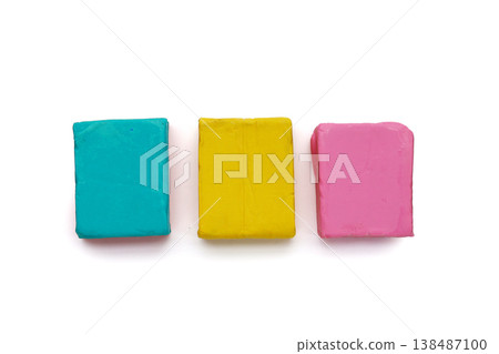Colorful plasticine clay on white background. Colorful plasticine clay on white background. 138487100