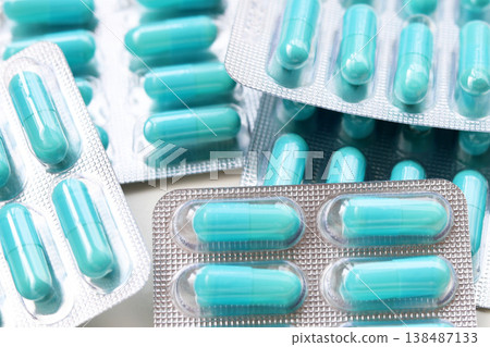 Blue capsules of Doxycycline in blister packs. 138487133