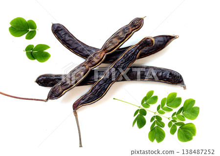 Dried rain tree pods isolated on white background Dried rain tree pods isolated on white background 138487252