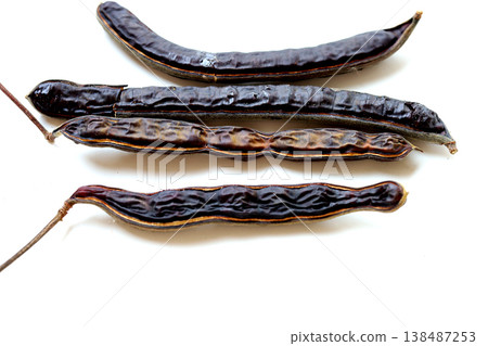 Dried rain tree pods isolated on white background Dried rain tree pods isolated on white background 138487253