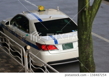 Private taxi vehicles parked on the street 138487254
