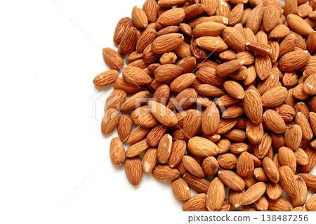 Almond nuts isolated on white background 138487256