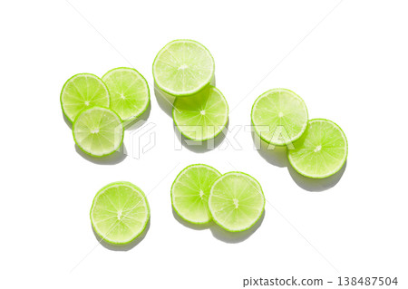 Fresh green lime slices on whiate background. 138487504